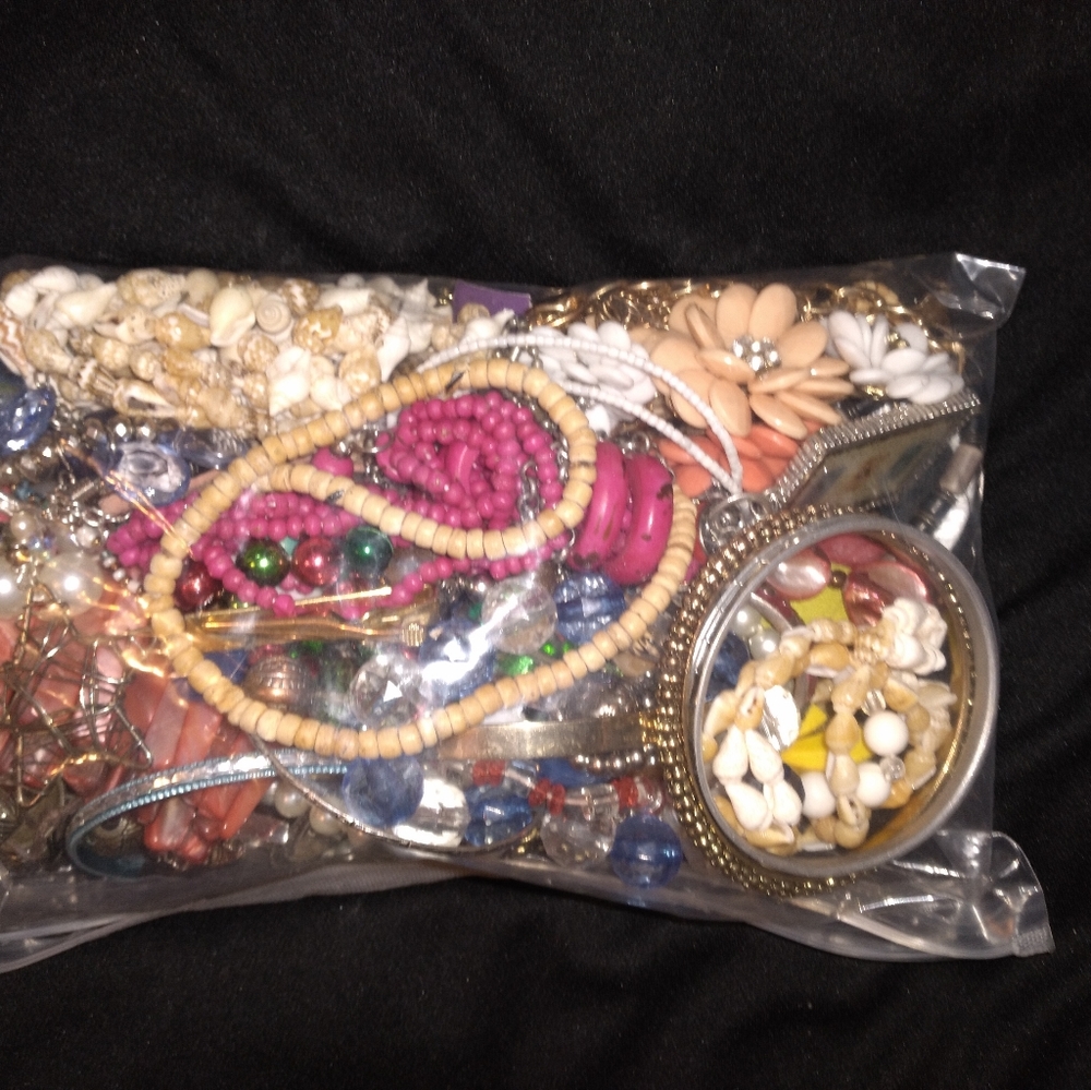 Mystery bag of mixed jewelry.